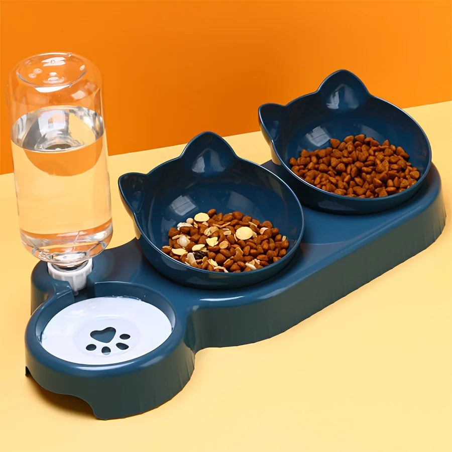 Comedero para gato con bebedero dosificador y dos comederos inclinados. Previene problemas en columna, cuello y ayuda a la digestión por su posición elevada.